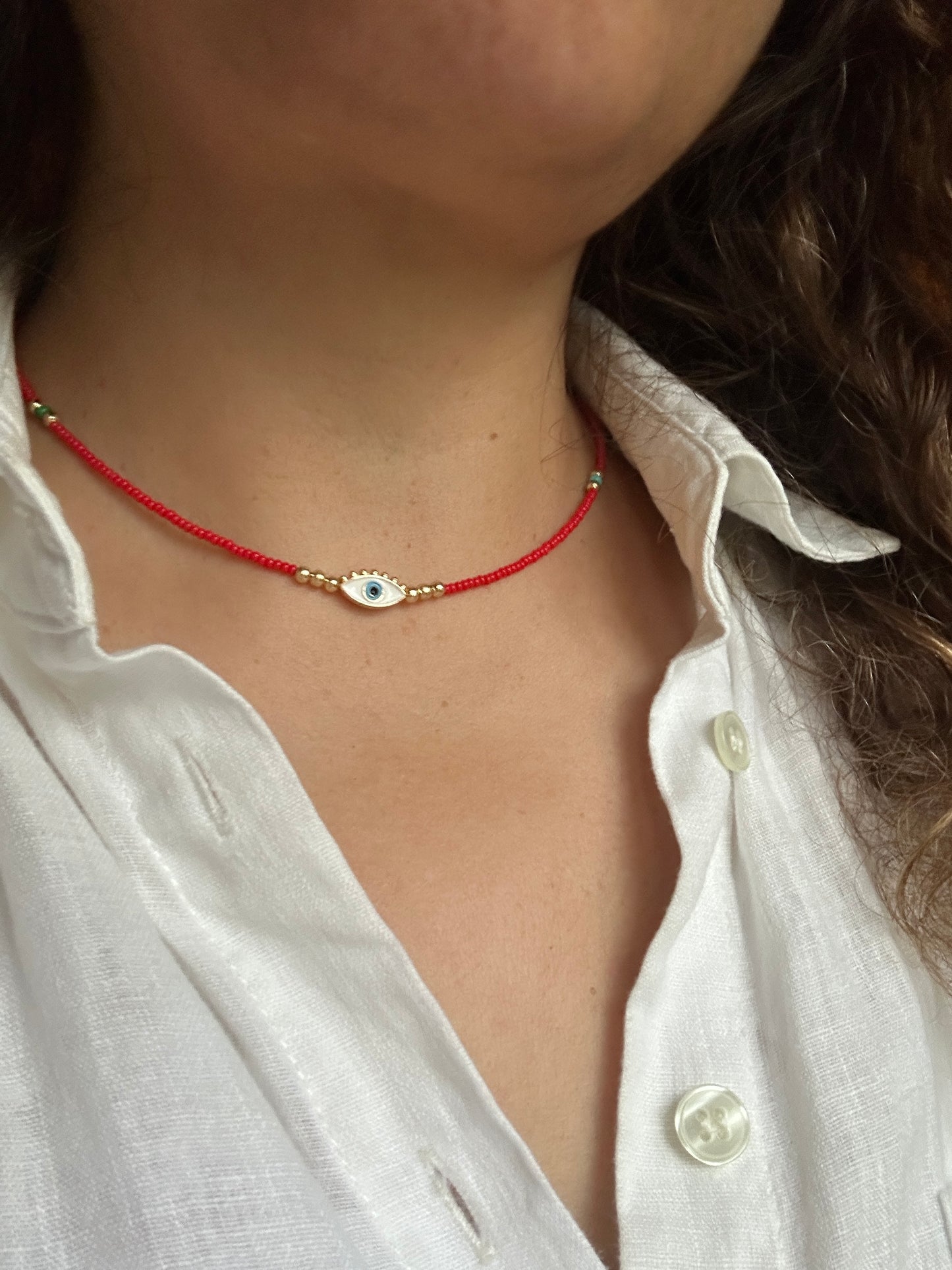 Gold plated evil eye necklace 14 inches red beads