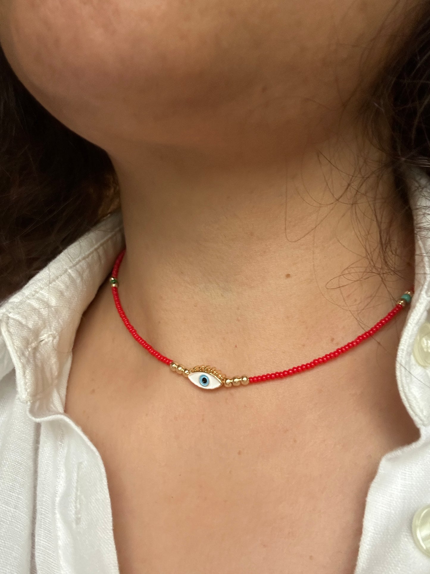 Gold plated evil eye necklace 14 inches red beads