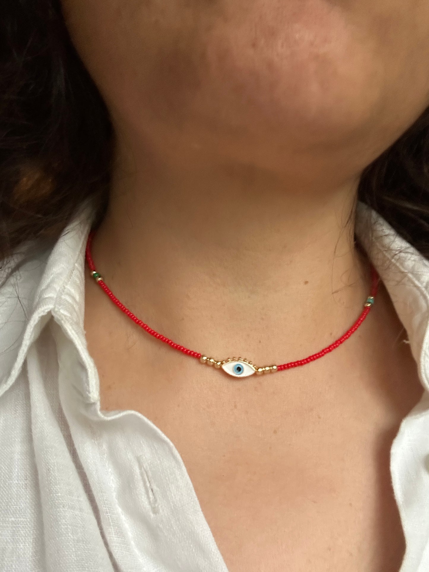 Gold plated evil eye necklace 14 inches red beads
