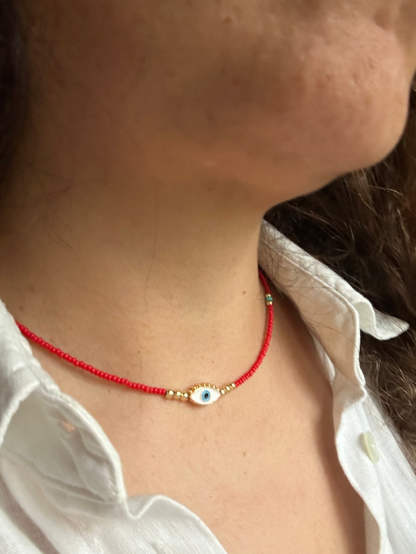 Gold plated evil eye necklace 14 inches red beads